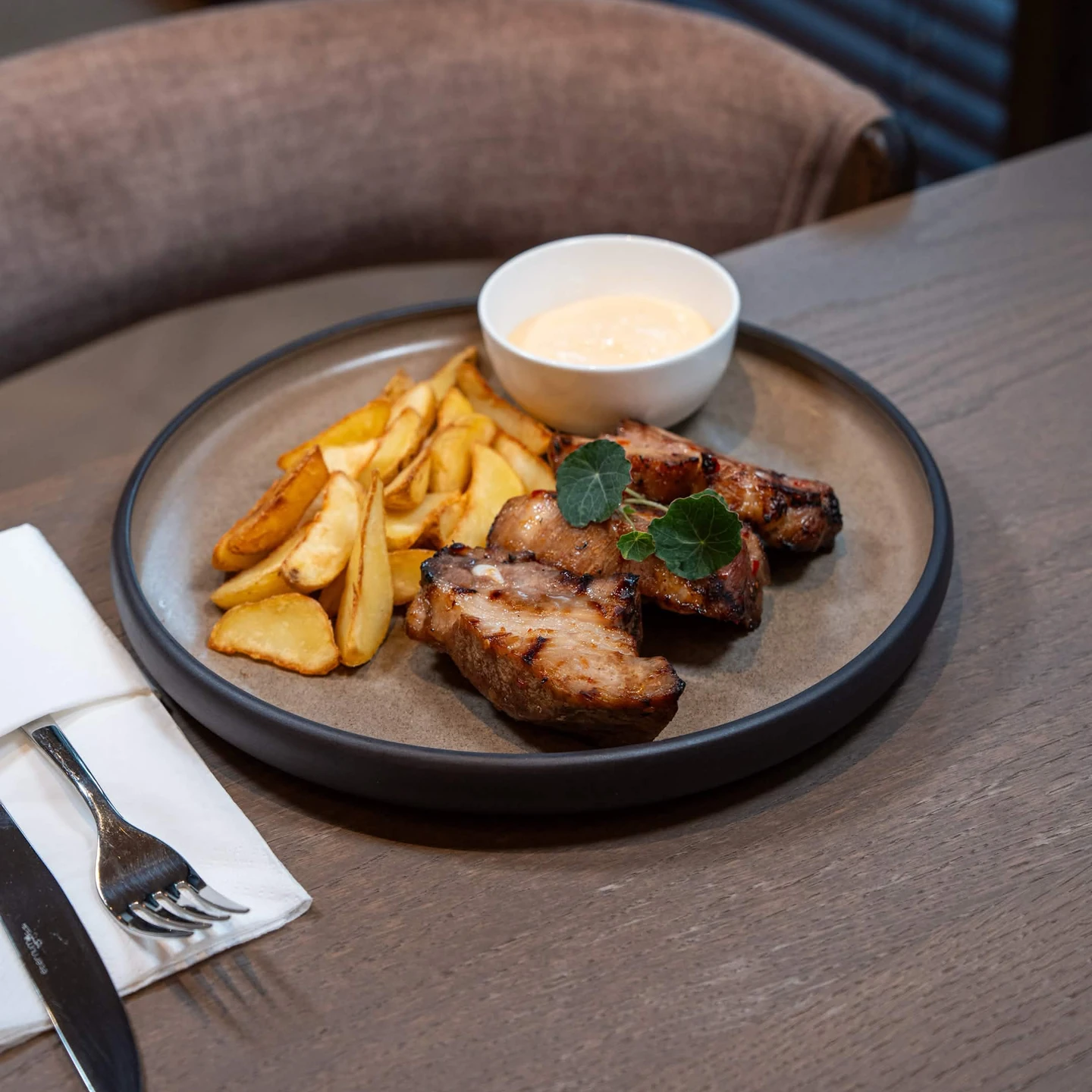 BBQ Pork Ribs with Potato Wedges and Cheddar Sauce